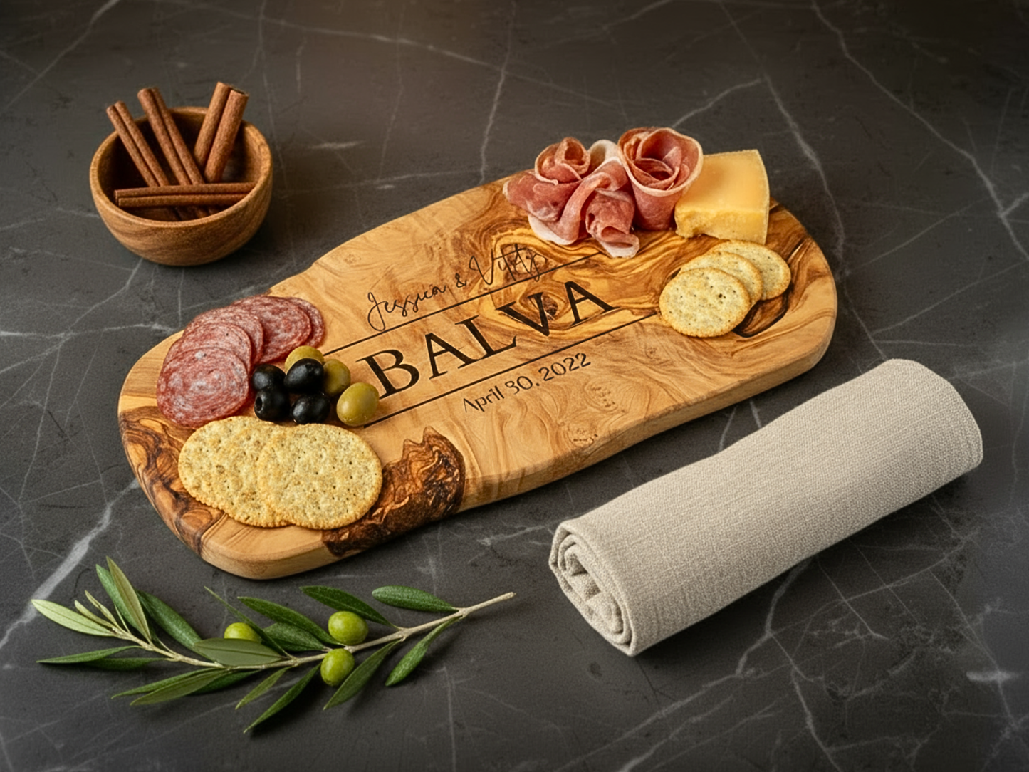Wooden charcuterie board with food items on a dark surface